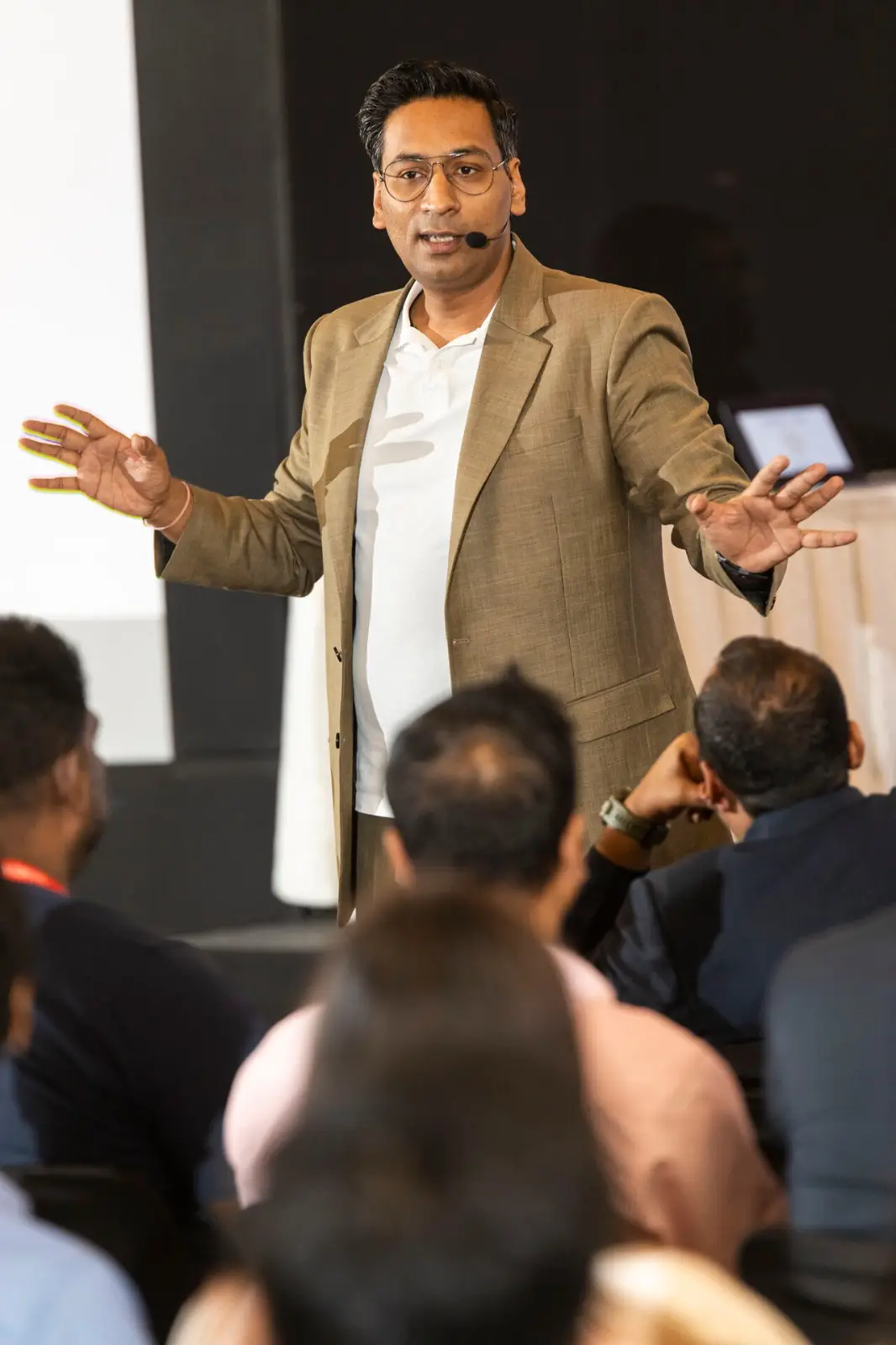 Paritosh Pathak speaking on stage